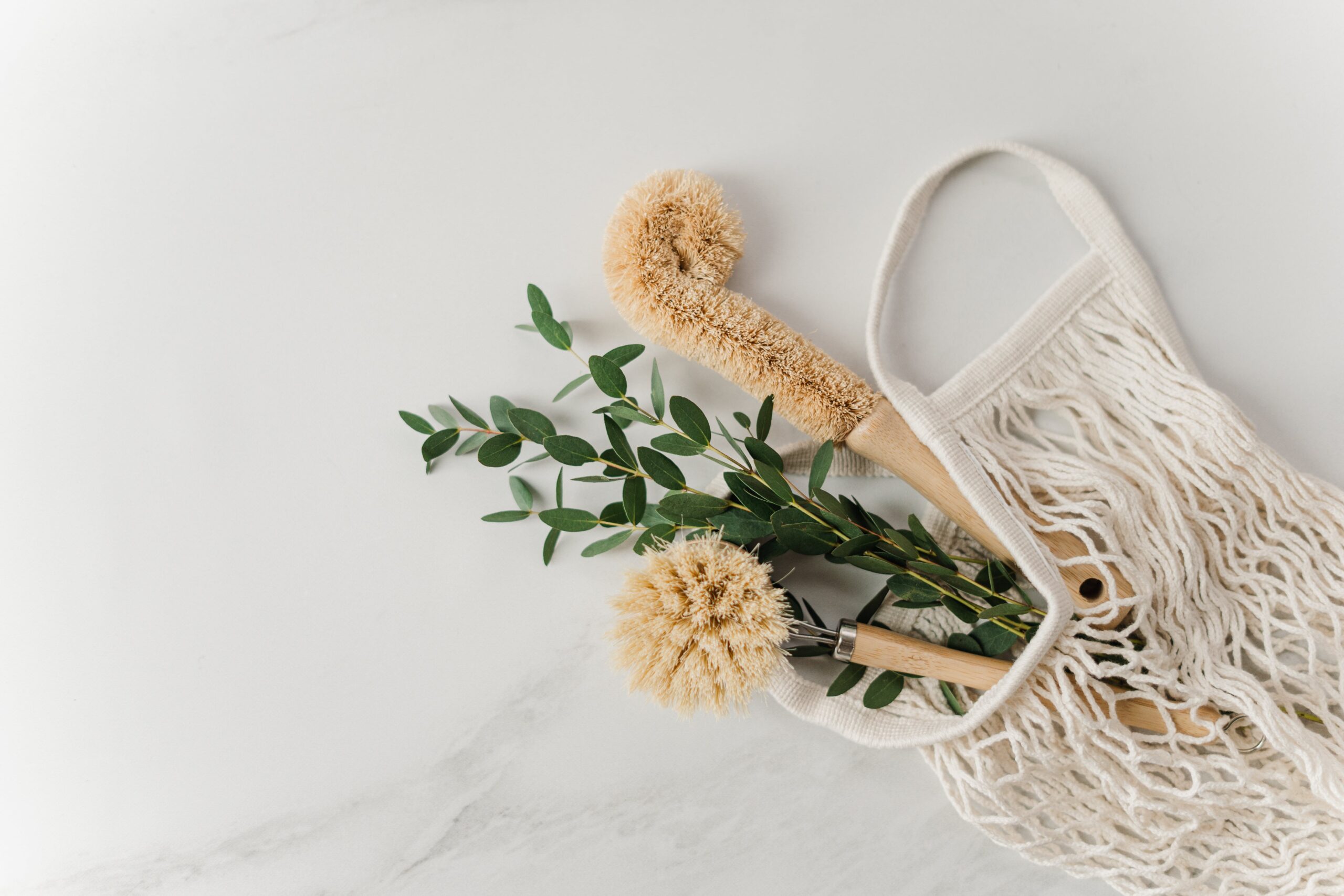 pexels-cottonbro-studio-3737576 cleaning supplies in woven bag owasso homes for rent blog fall cleaning tips