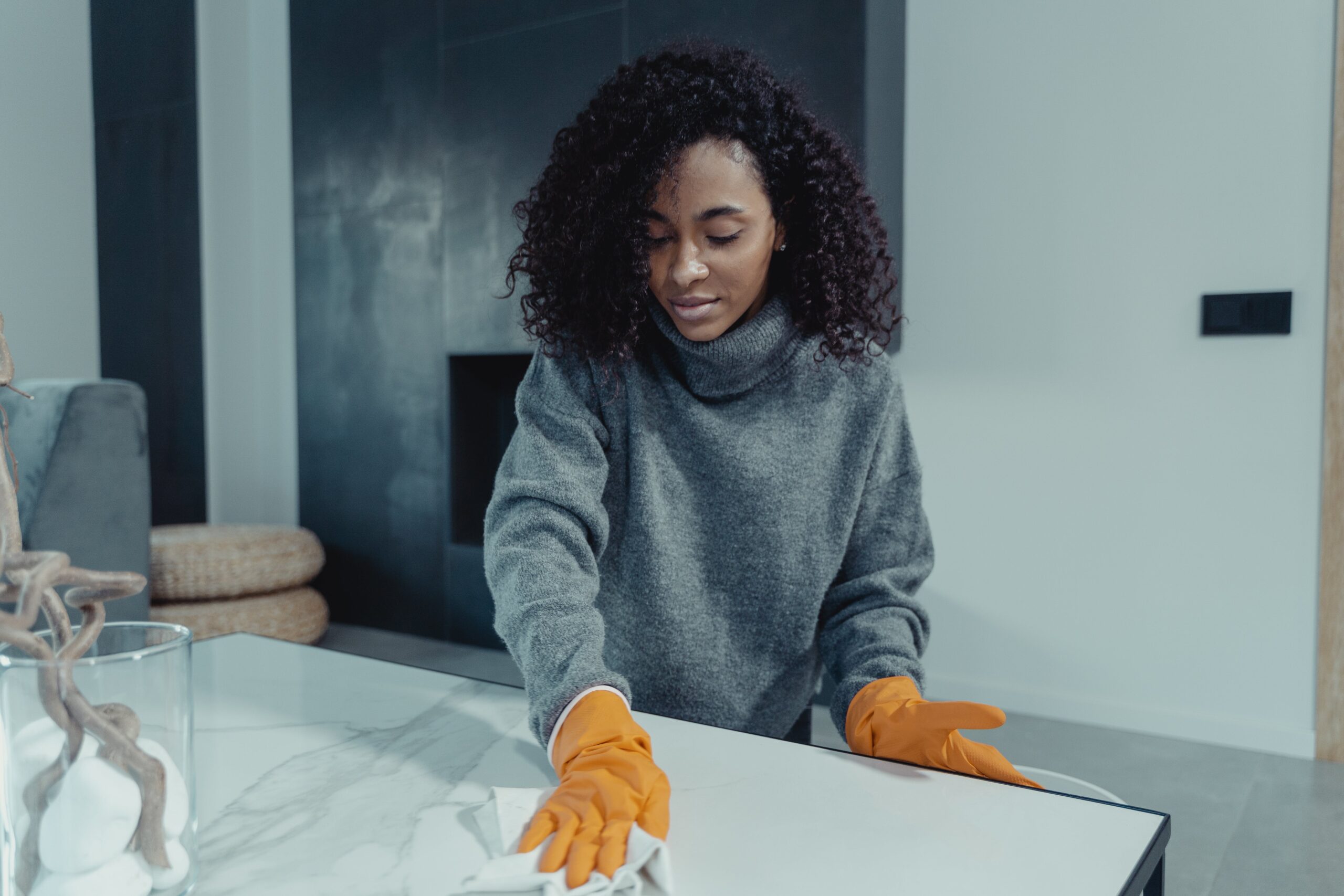 woman cleaning her house rental home living in owasso blog winter cleaning