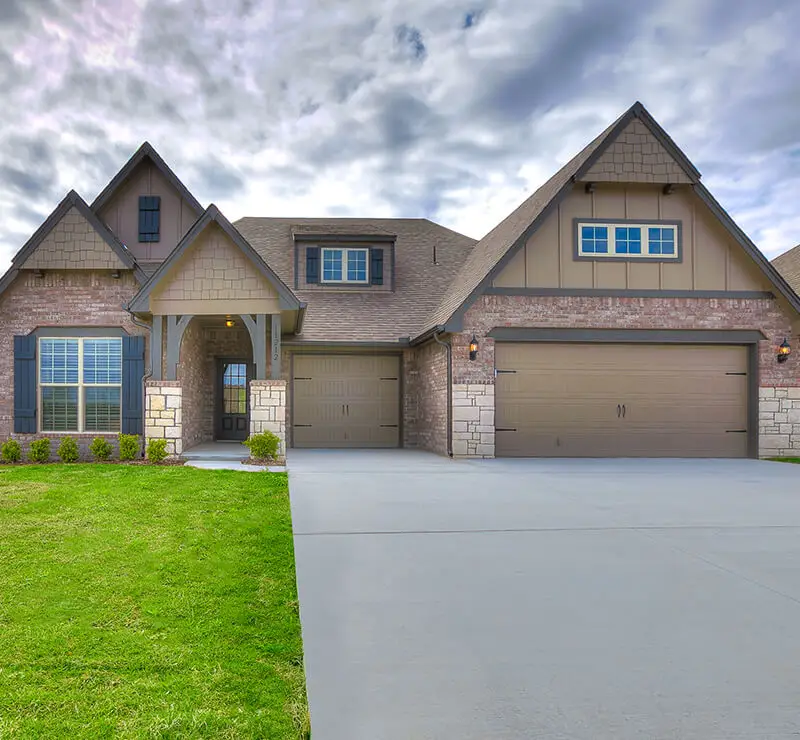 Legacy Living house for rent in Tulsa, OK with modern exterior and landscaped yard