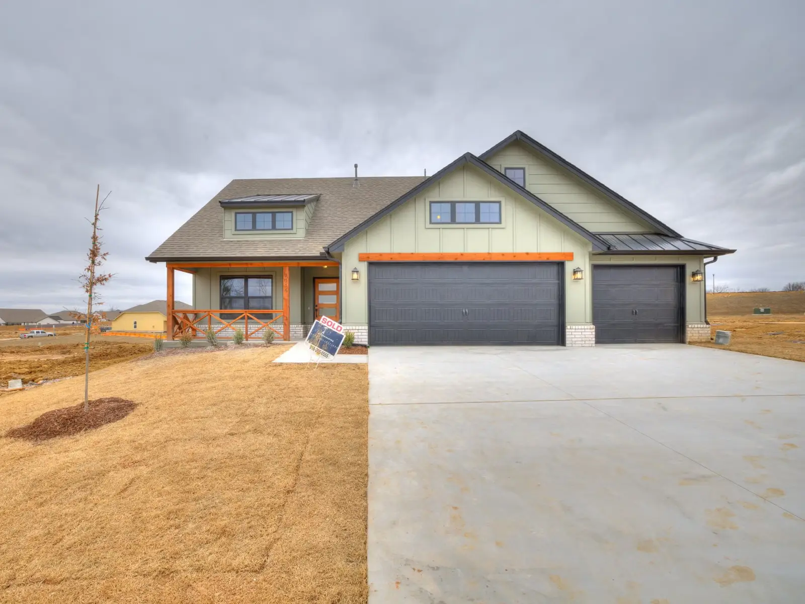 Legacy Living home for rent in Tulsa featuring neutral exterior tones and clean lines