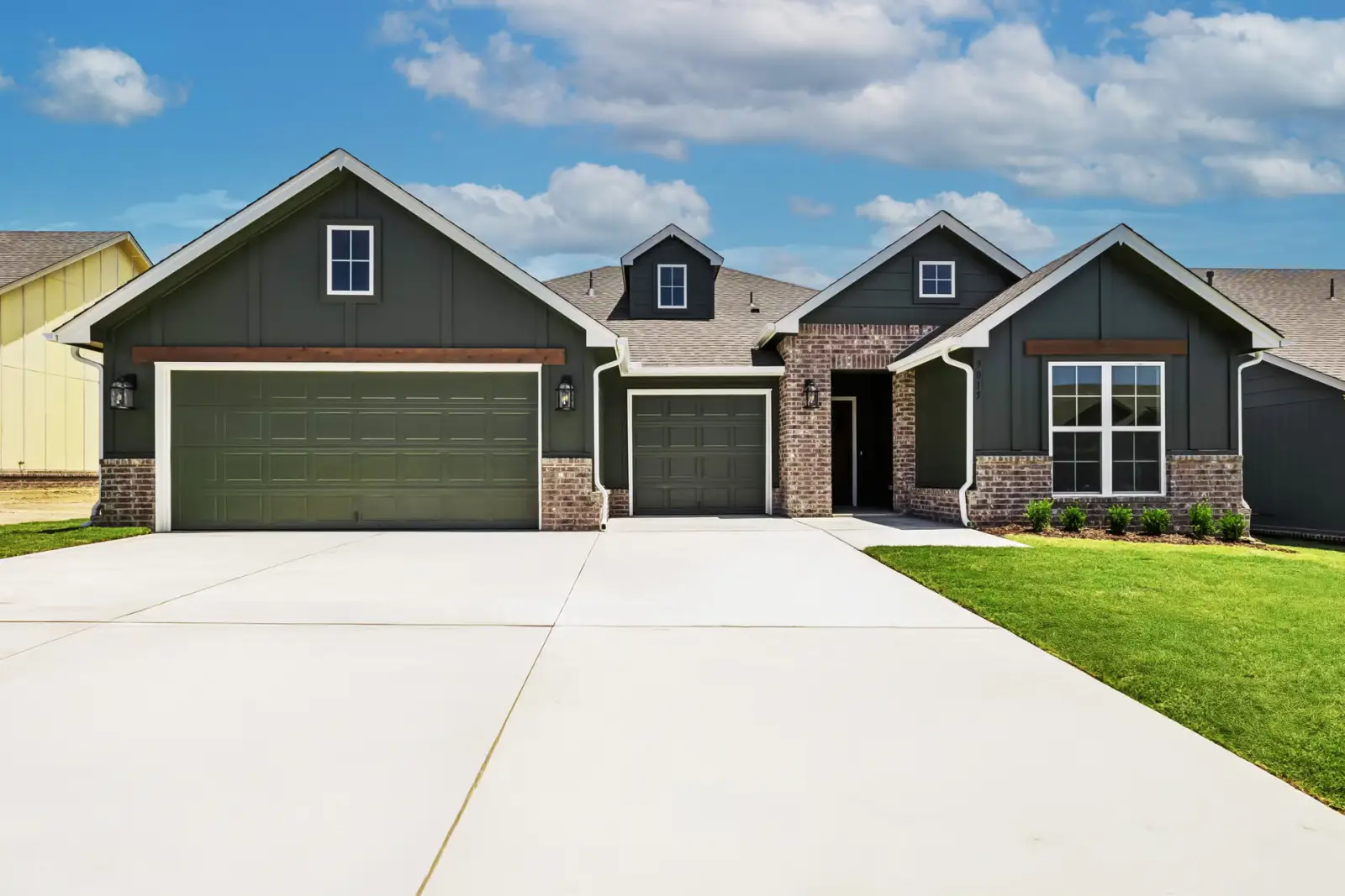 Legacy Living Tulsa rental house featuring updated exterior and green lawn