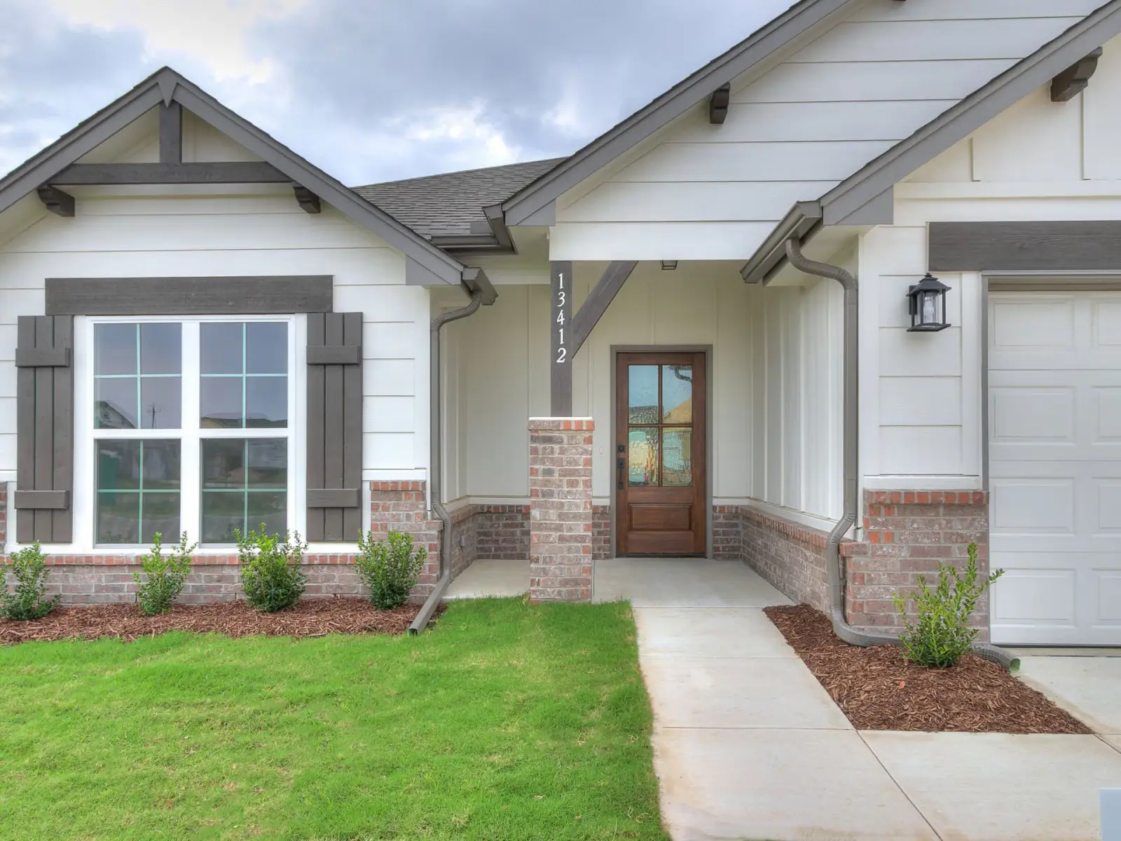 Legacy Living house for rent in Tulsa with welcoming front porch and walkway