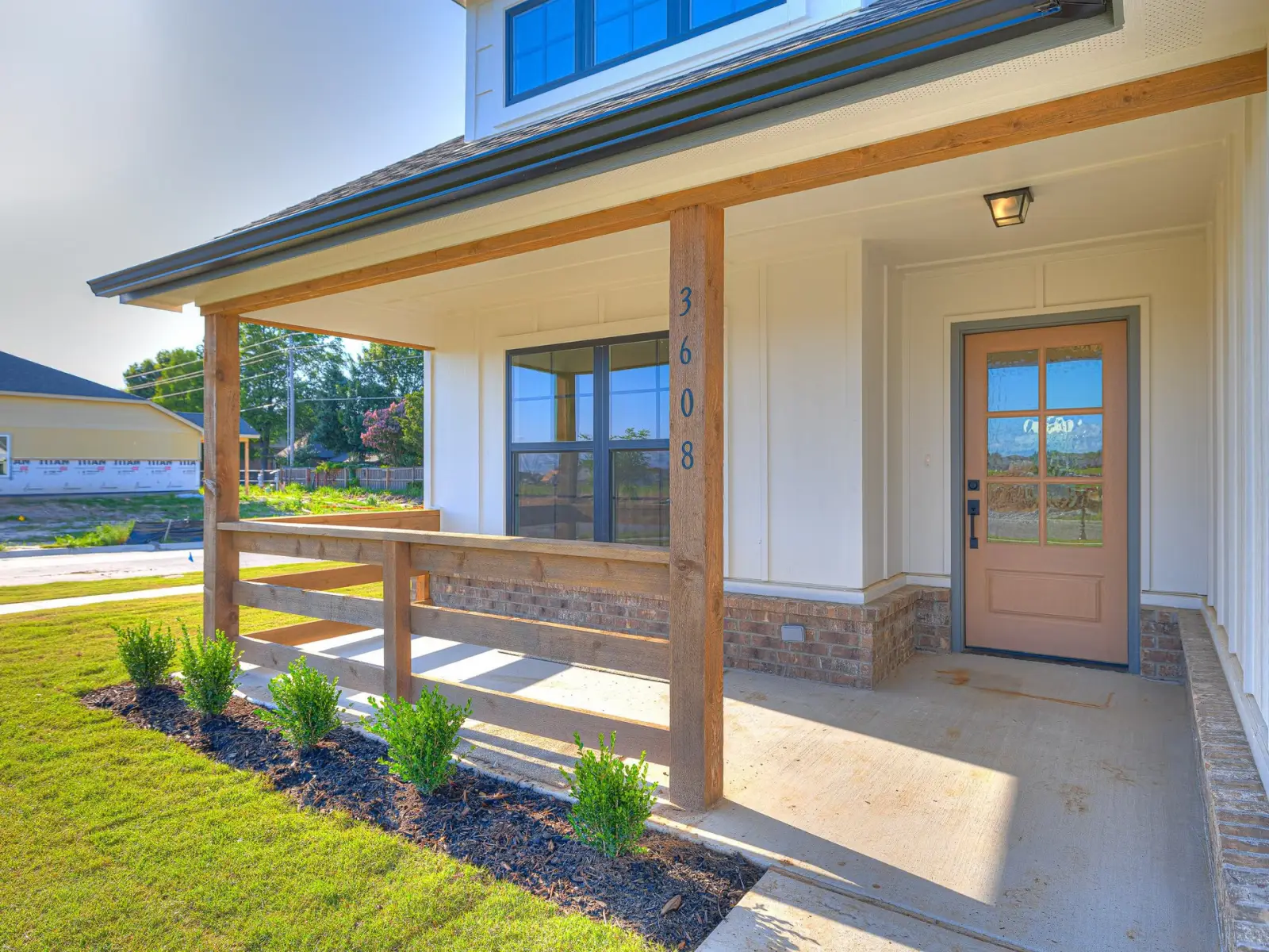 Legacy Living Tulsa home exterior with stone detailing and front entryway