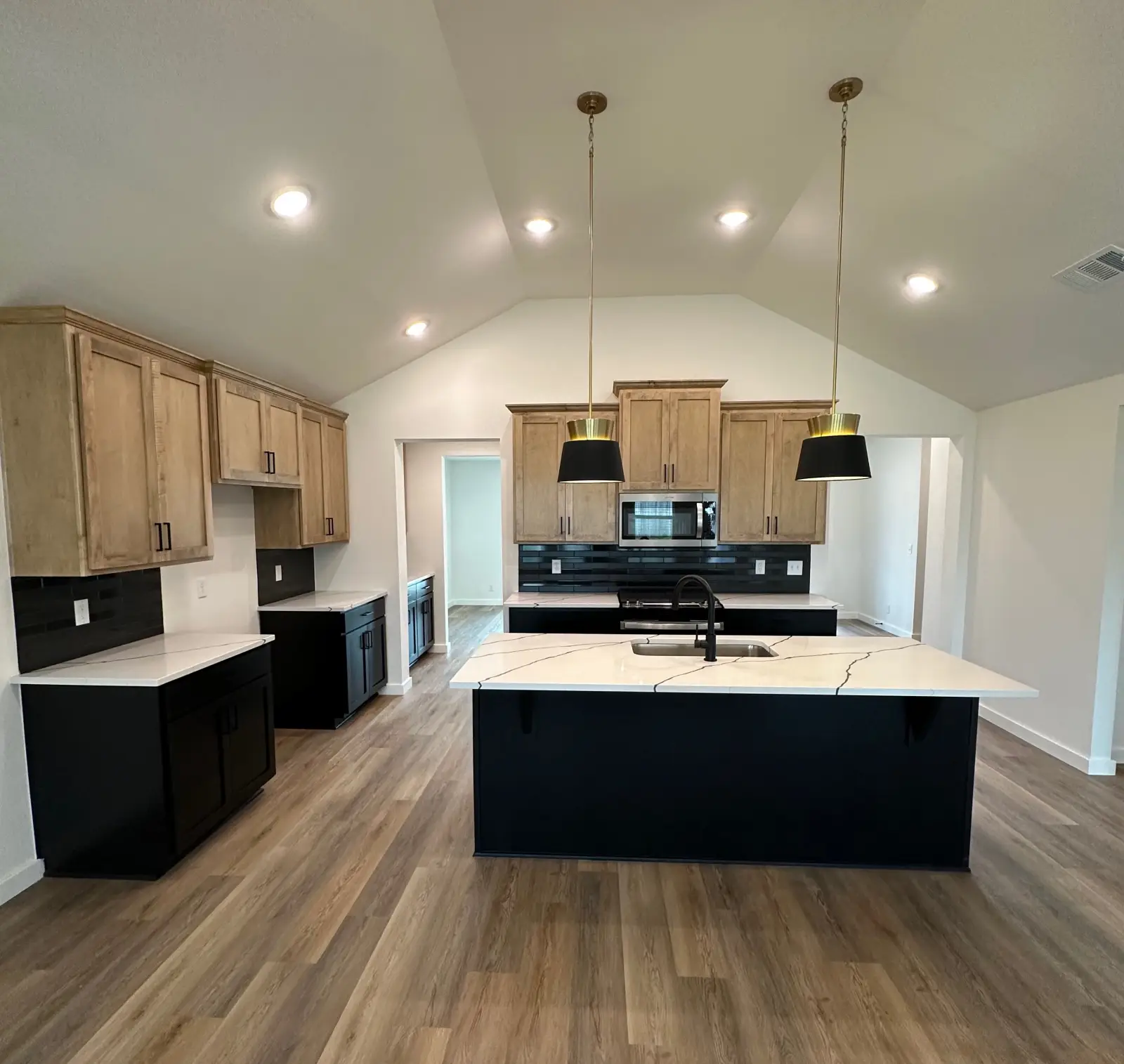 Legacy Living house for rent in Tulsa showcasing bright kitchen design and storage space