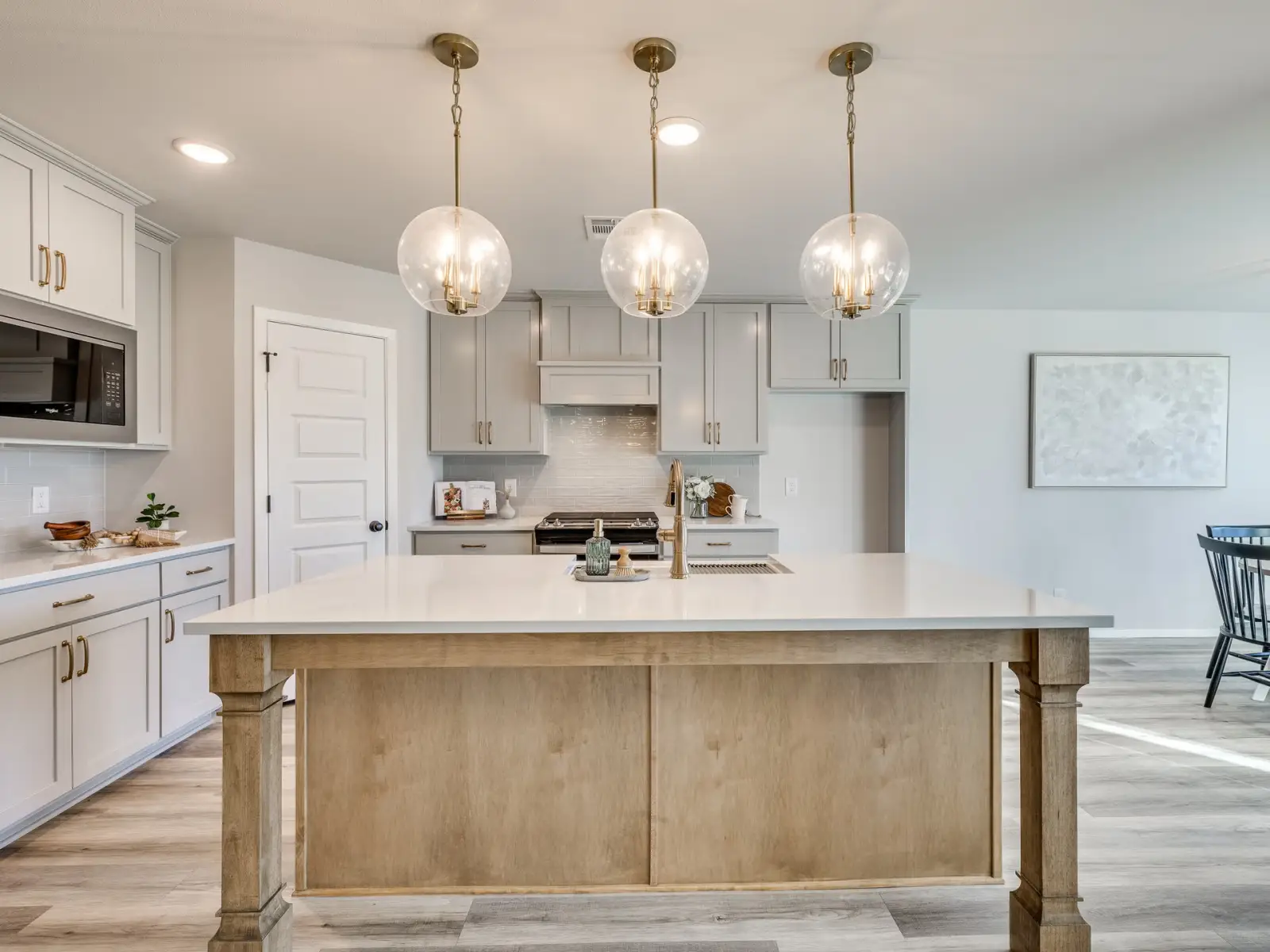 Legacy Living Tulsa house kitchen featuring updated appliances and storage space